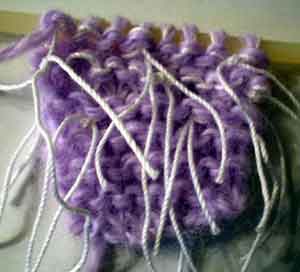 Home-made eyelash yarn knitting sample