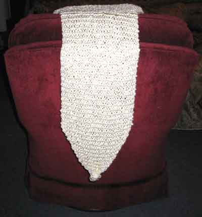Back view of the pocket pillow on a chair
