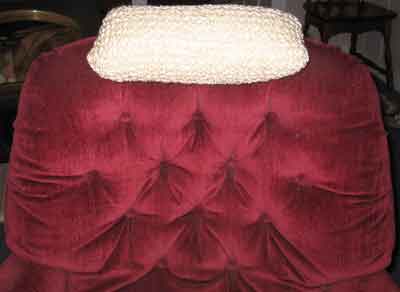 Front view of the pocket pillow on a chair